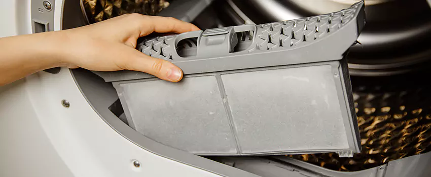Signs Of A Clogged Dryer Lint Trap in Ives Estates, Florida
